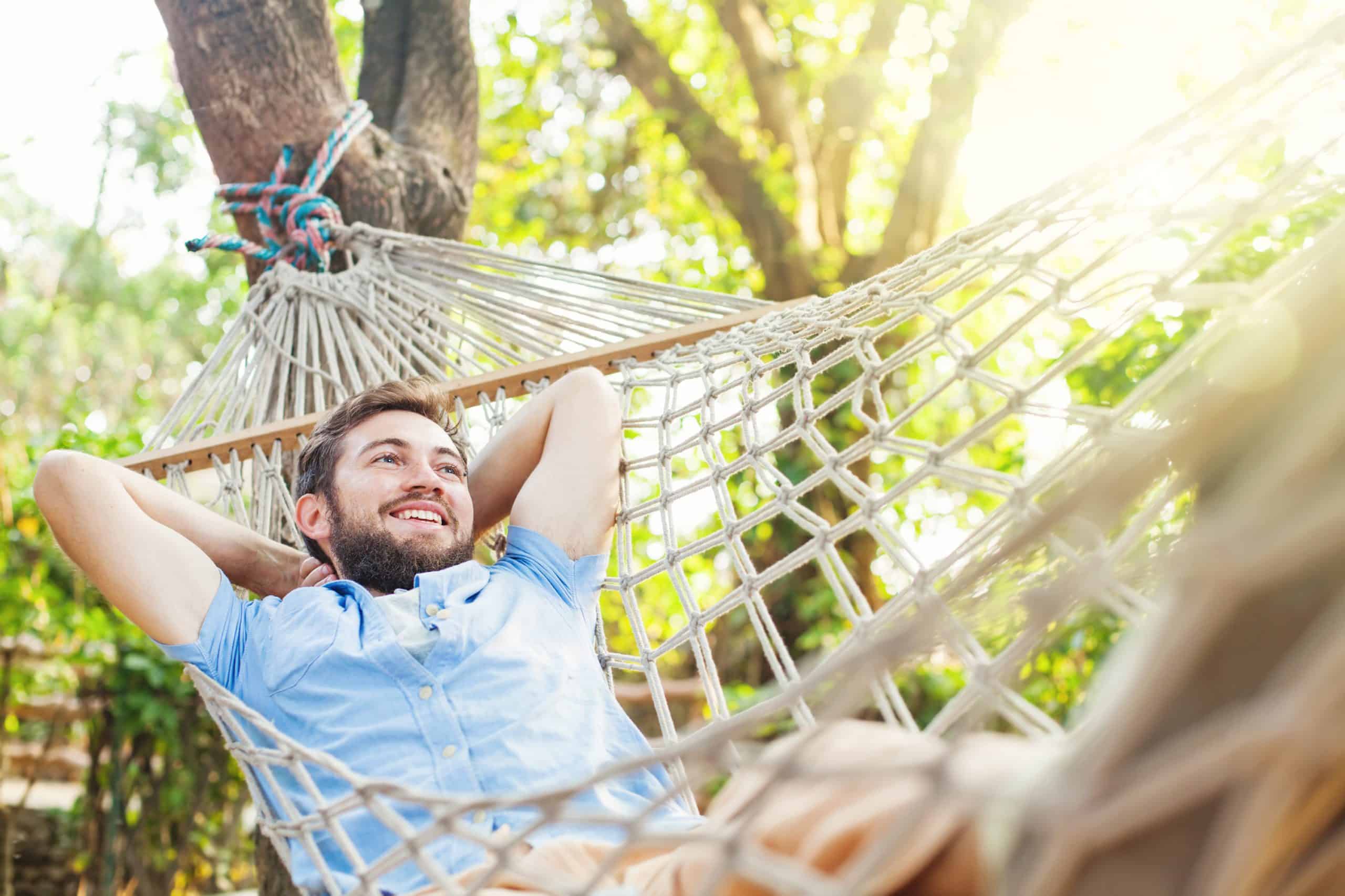 Make Life Easier man laying in a hammock